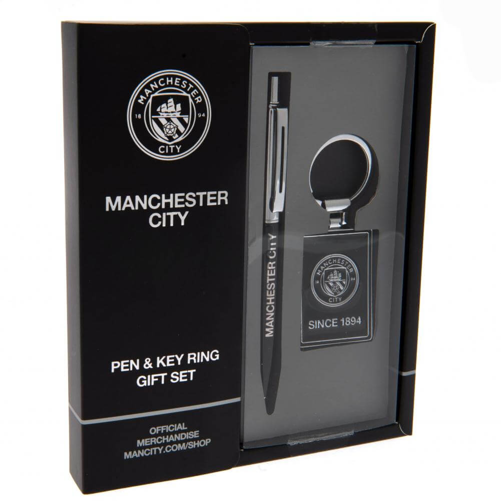 Manchester City gavesæt med pen og nøglering i sort emballage med klublogo og "SINCE 1894".