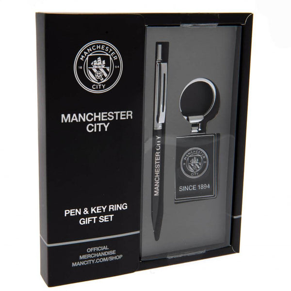 Manchester City gavesæt med pen og nøglering i sort emballage med klublogo og "SINCE 1894".