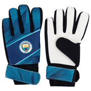 Manchester City målmandshandsker med logo, blå mønster og justerbare stropper for sikker pasform.