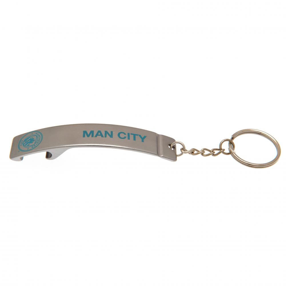 Metal nøglering med "MAN CITY" og logo i blå, integreret oplukker og nøglekæde.