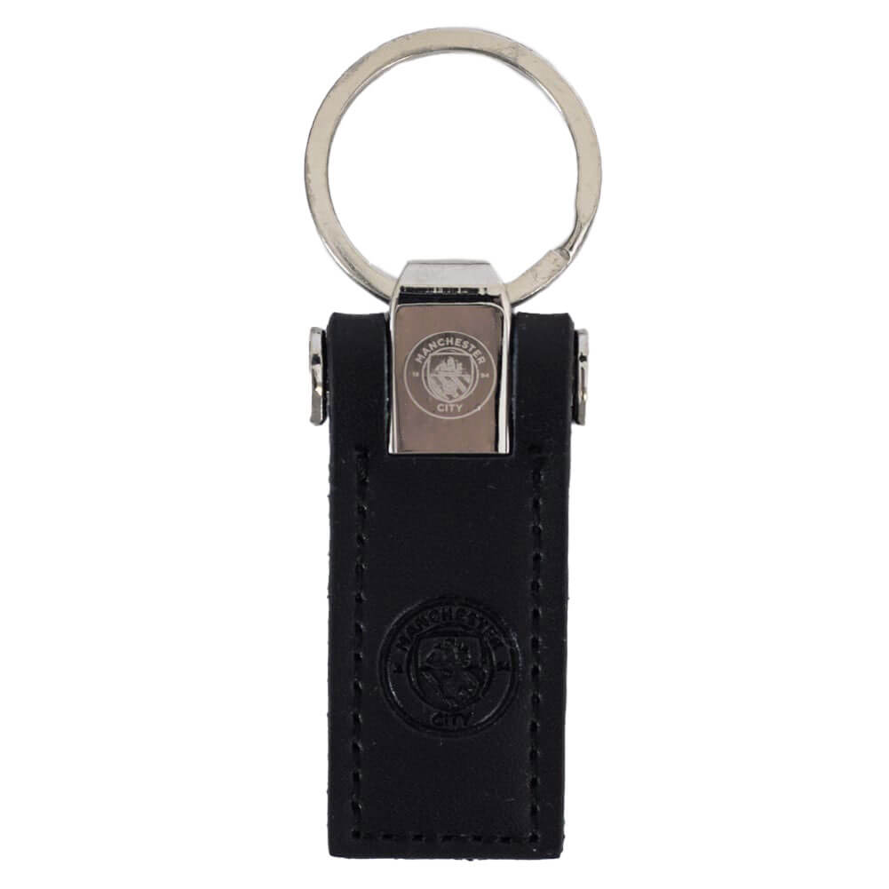 Lædernøglering med metalring og sort holder. Manchester City logo præget på læderet.