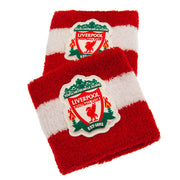 To røde og hvide svedbånd med Liverpool FC-logo, der viser en rød fugl og teksten "You'll Never Walk Alone".