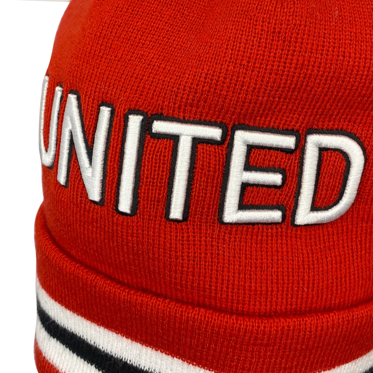 Retro strikket bobble-hue i fodboldklubbens farver