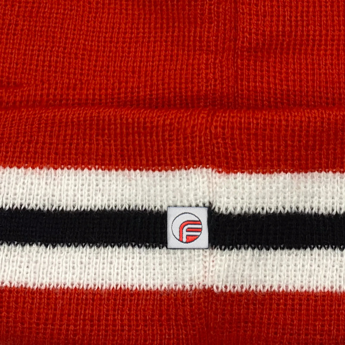 Retro strikket bobble-hue i fodboldklubbens farver