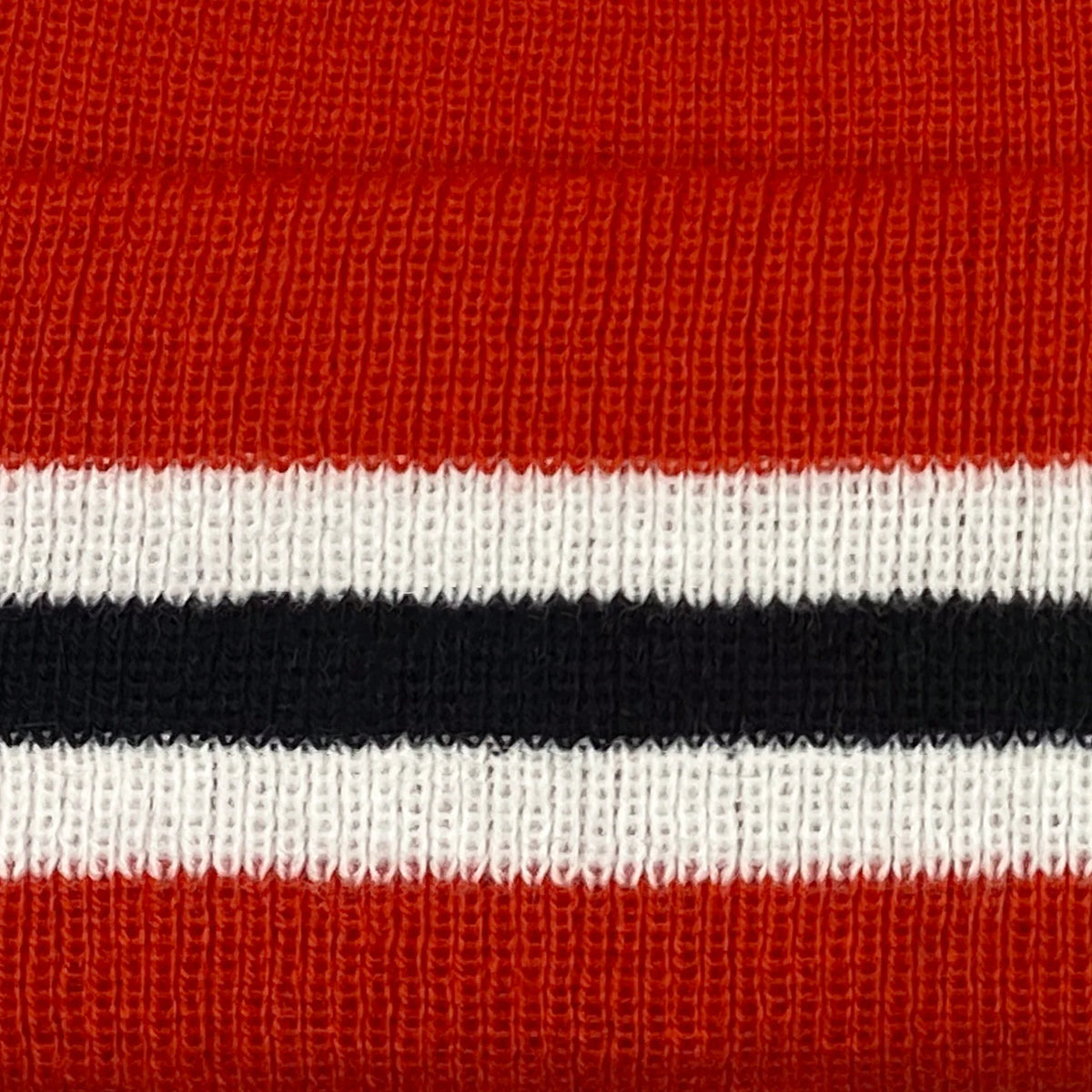 Retro strikket bobble-hue i fodboldklubbens farver