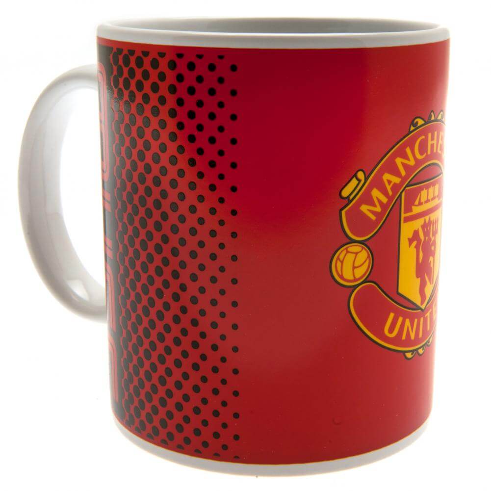 Rød krus med Manchester United-logo, sort prikket mønster, hvidt indre og hank.