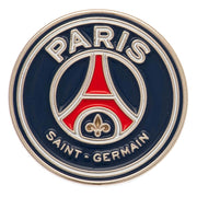 PSG-mærke med Eiffeltårn, mørkeblå baggrund, "PARIS" øverst, "SAINT-GERMAIN" nederst, fleur-de-lis.