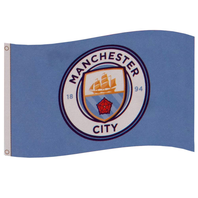 Manchester City FC-flag med lyseblå baggrund, emblem med skib, rød rose og årstal 1894, grommets til ophæng.
