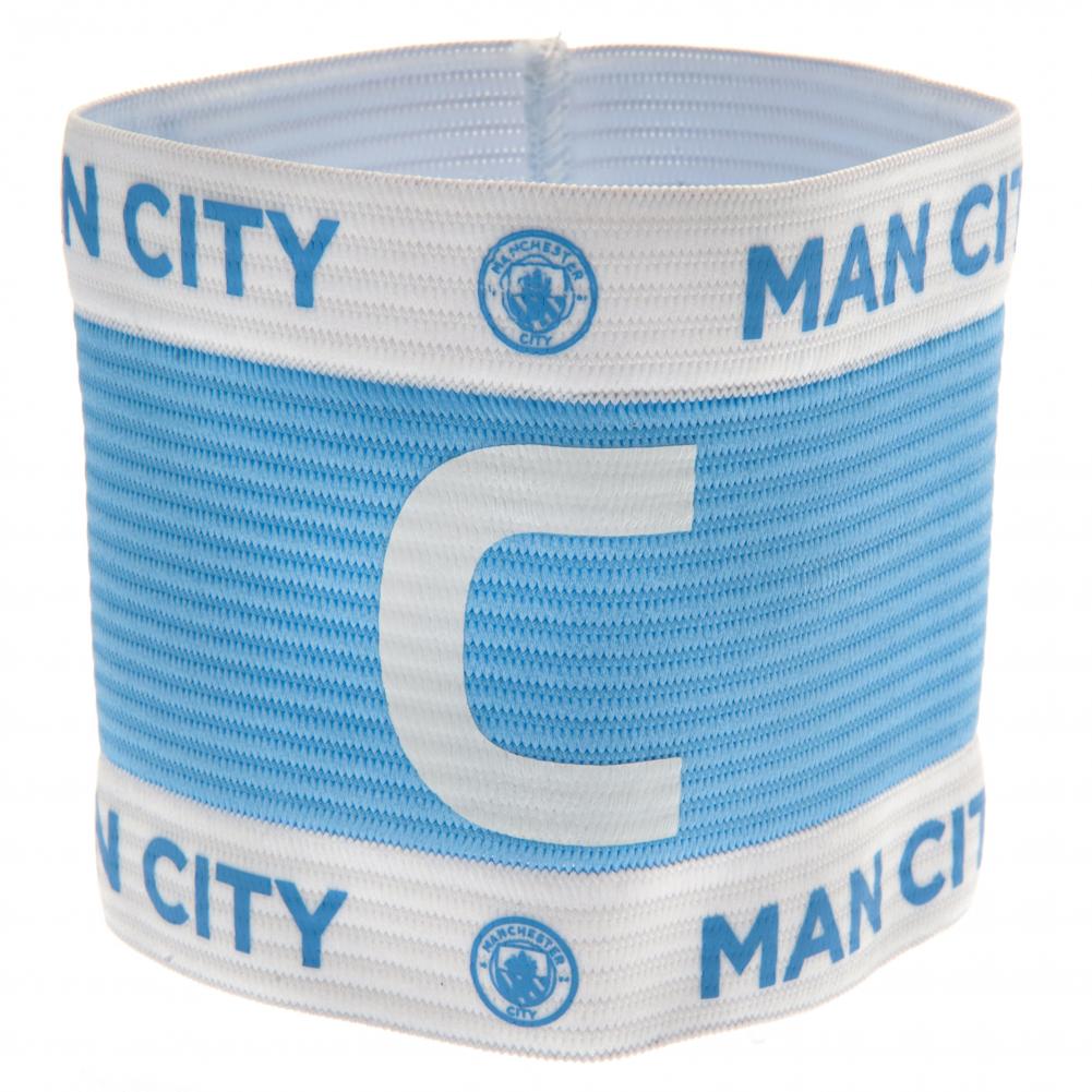 Blå og hvid anførerbind med stort "C" og Manchester City-logo.