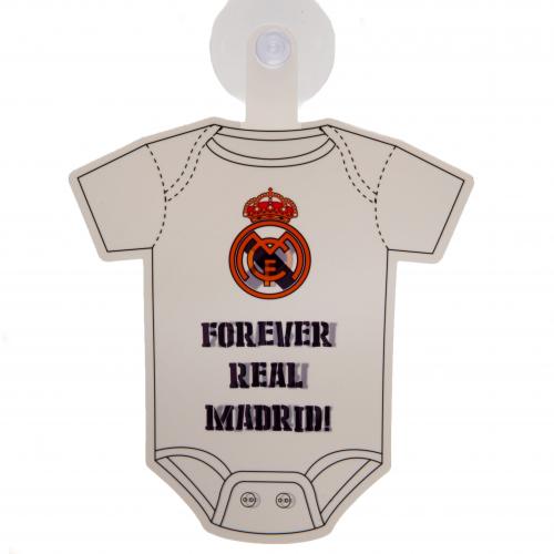 Hvid onesie-formet skilt med Real Madrid-logo og teksten "FOREVER REAL MADRID!"
