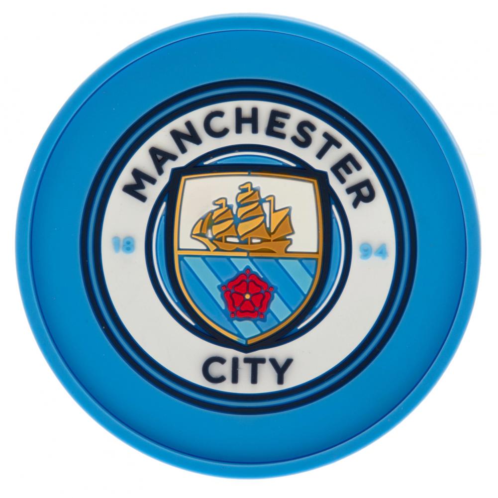 Rund ølbrik med blå kant, Manchester City FC logo med skib, rød rose og teksten "Manchester City".