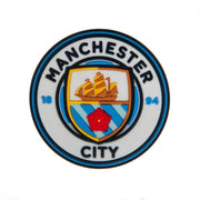 Manchester City FC logo med skib, rød rose, blå striber på en rund 3D-magnet.