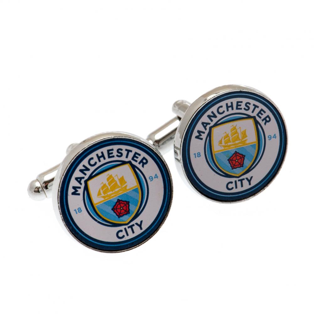 Runde manchetknapper med Manchester City-logo i metallic finish.
