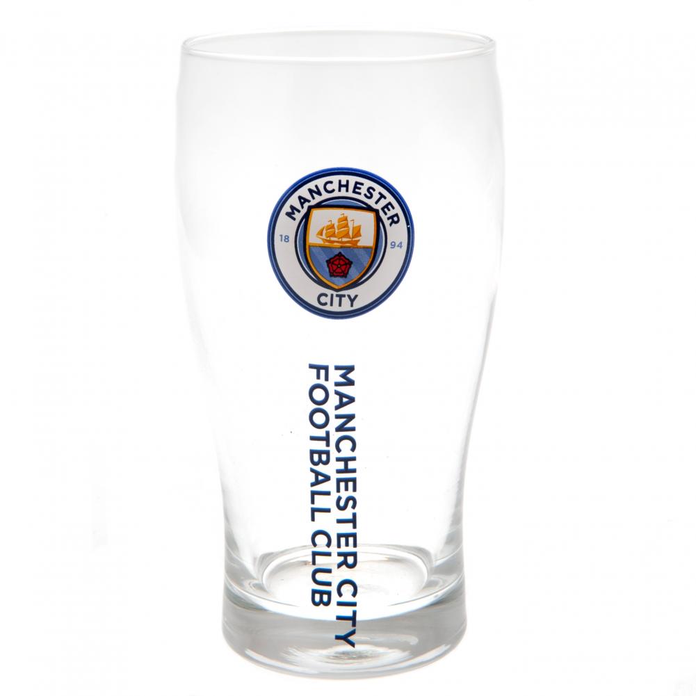 Glas med Manchester City FC-logo og teksten "MANCHESTER CITY FOOTBALL CLUB" vertikalt på siden.