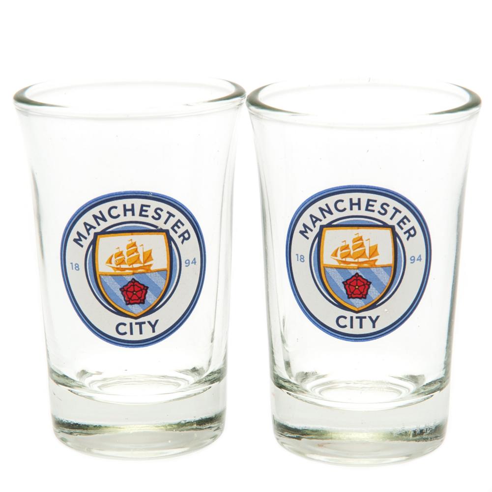 To ens glas med Manchester City FC-logo, klart glas, klassisk form.