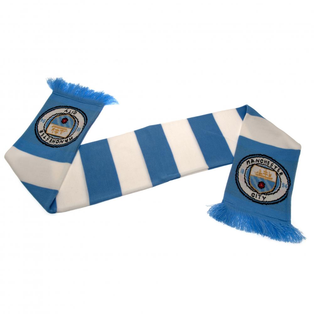 Halstørklæde med lyseblå/hvide striber, frynser og Manchester City FC logo på hver ende.