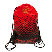 Rød Manchester United gymnastikpose med logo, sort mønster og "MUFC" tekst nederst.